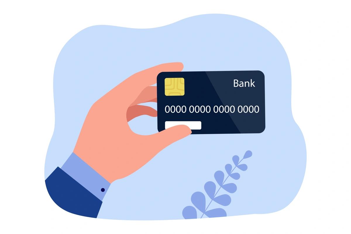 An illustration of a man's hand holding a black debit card for his bank account.